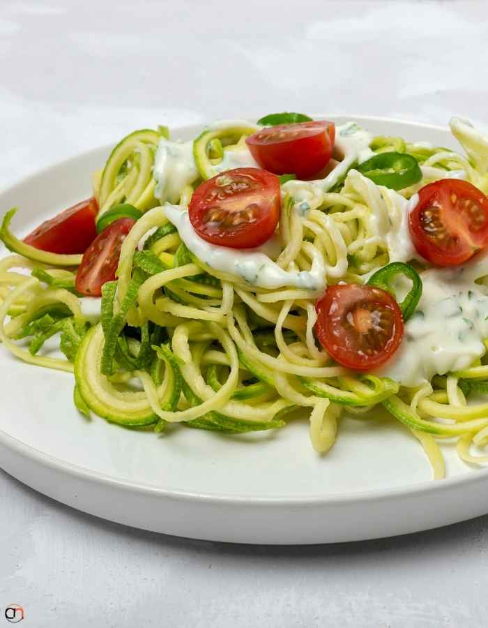 Zucchini Noodles with Pesto and Cherry Tomatoes